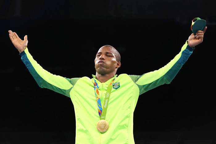 Robson Conceição conquistou a primeira medalaha de ouro para o Brasil, no boxe, em jogos olímpicos. Foto: Getty Images. 